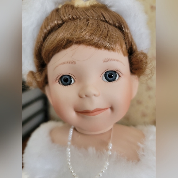 Charming Porcelain Doll with Lace Details and Rosy Cheeks - Picture 2 of 5